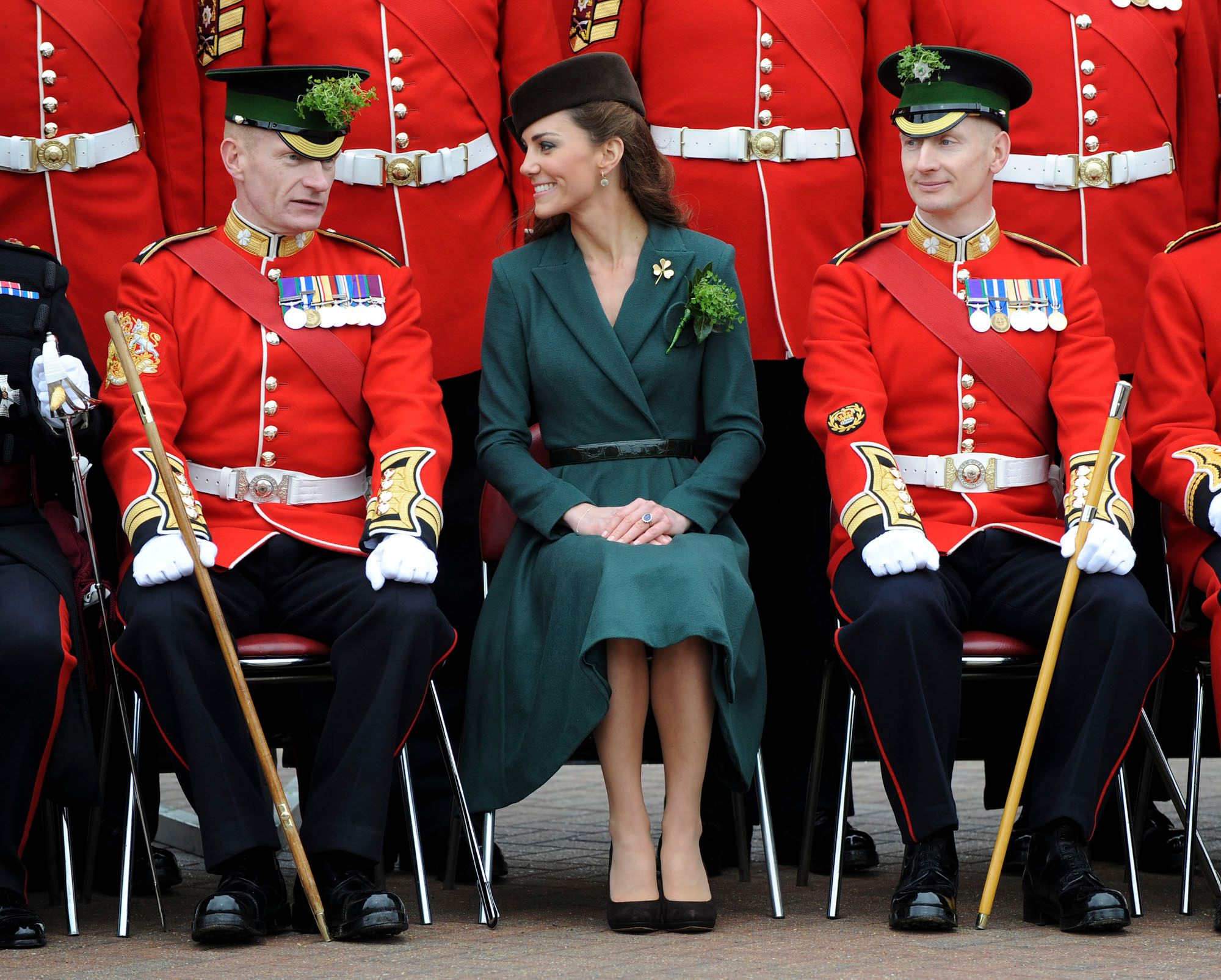 Kate Middleton, The Princess of Wales, sits with Irish Guards on St Patricks Day.