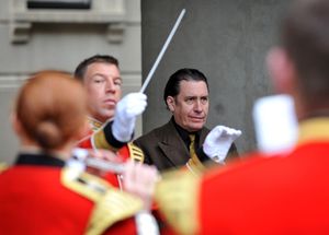Jools Holland listens to the Guards Band prior to Changing of the Guard.