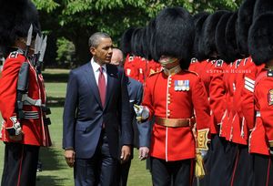 President Obama receives a Guard of Honour in the rear garden of Buckingham Palace.