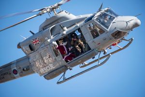 Santa flying over military houses in Cyprus on Christmas Eve.