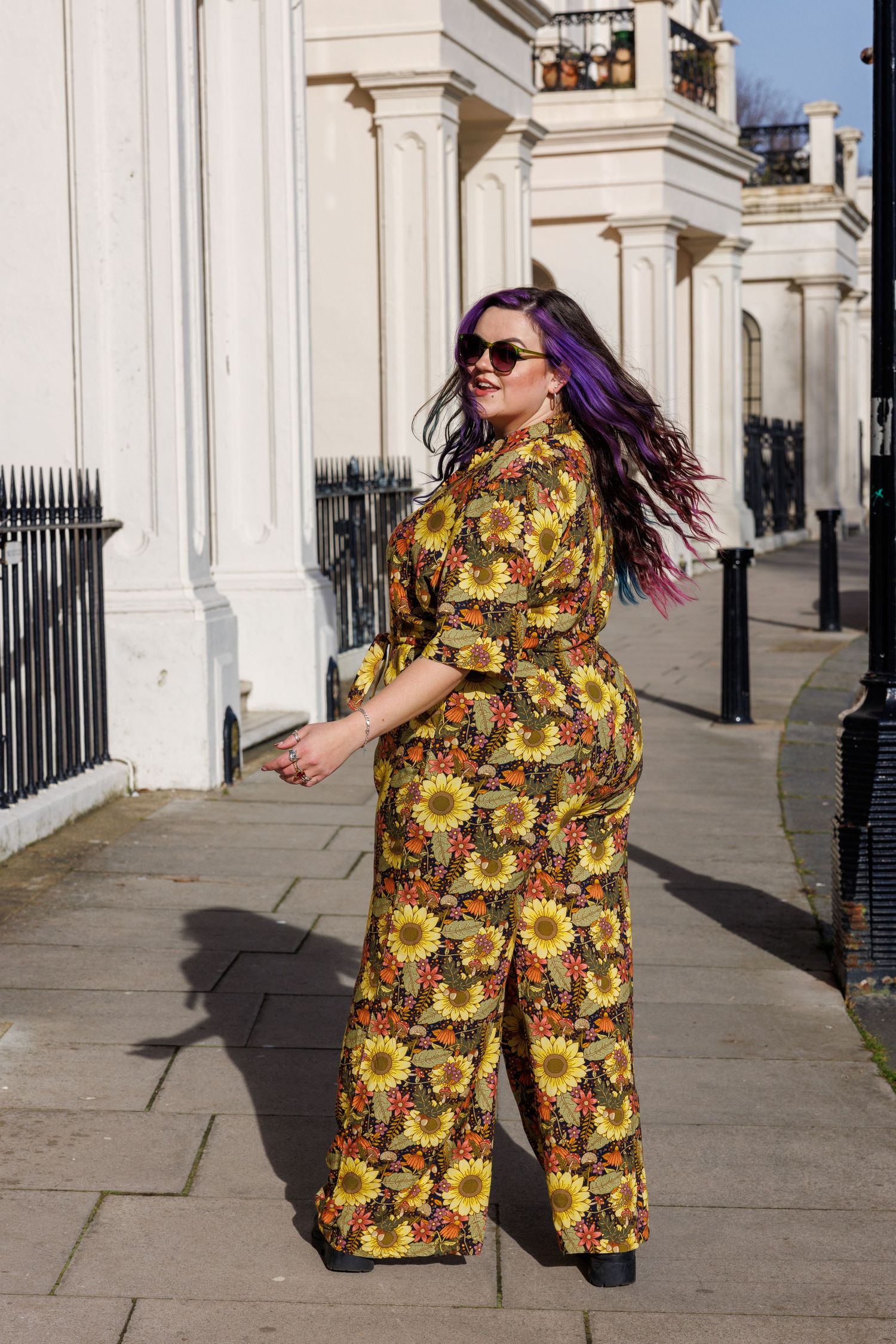Model in central Hove looking super cool flicking their multi coloured hair over their shoulder as they walk away