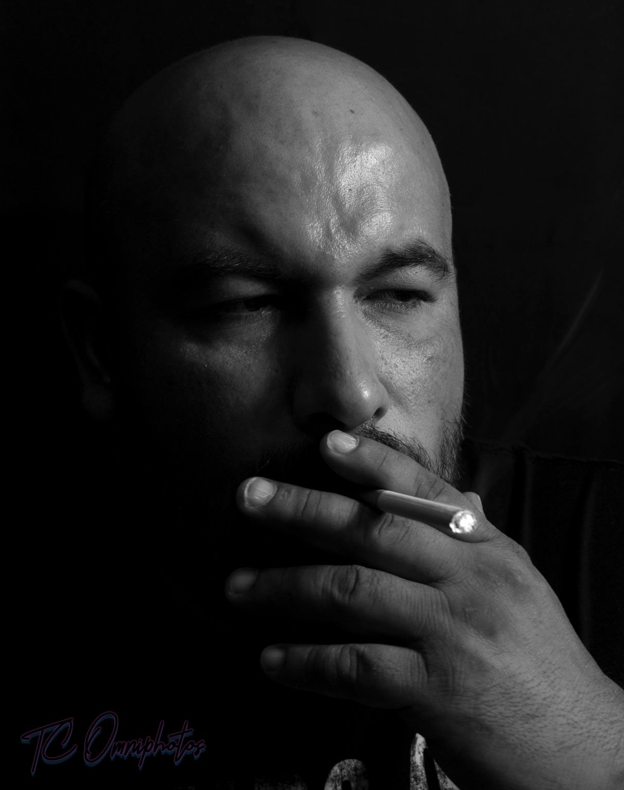 a striking black and white headshot