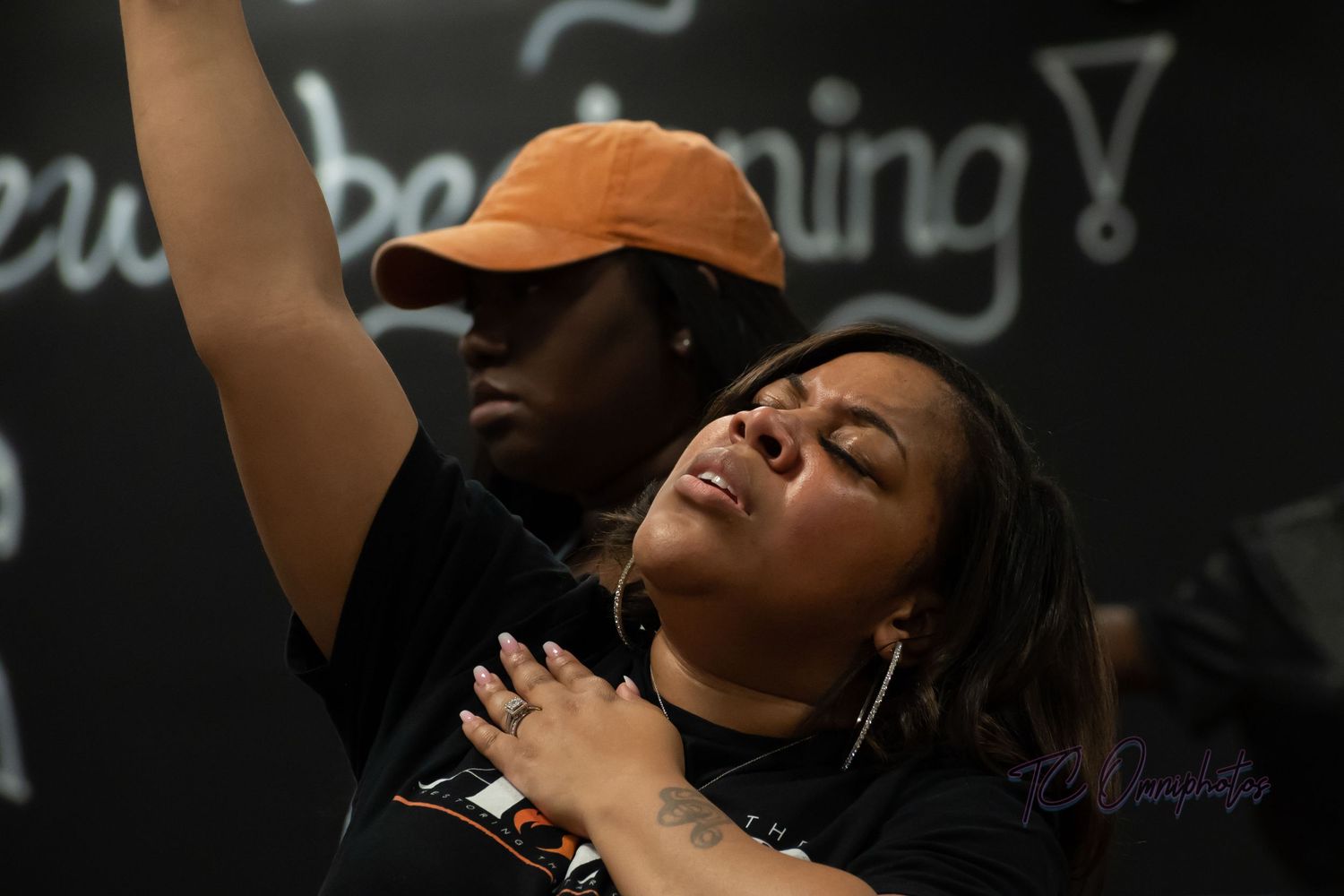 candid shot during a praise gathering.