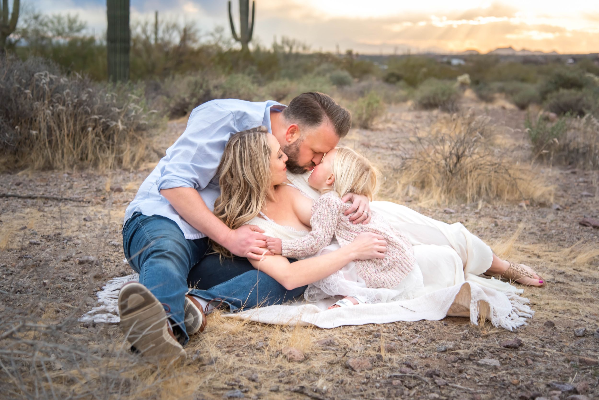 mother and daughter dancing in the Queen Creek Wash at Arizona photoshoot