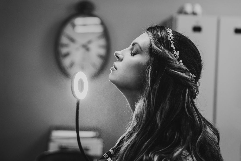 Black and white portrait series showing emotional moments during a wedding ceremony.