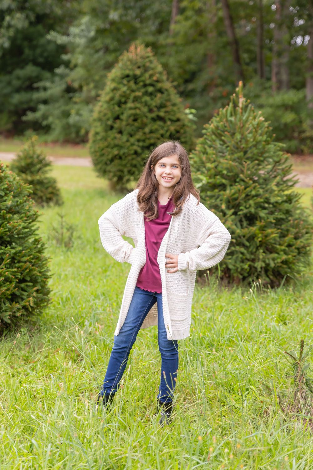 one kid standing in christmas tree farm at turkey trac farms in millville new jersey cumberland county