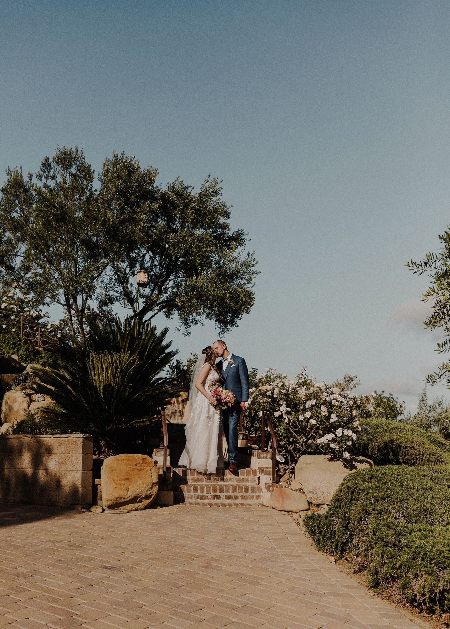 E Noelle Photography backyard wedding in Hidden Hills Los Angeles, bride and groom portrait under tree