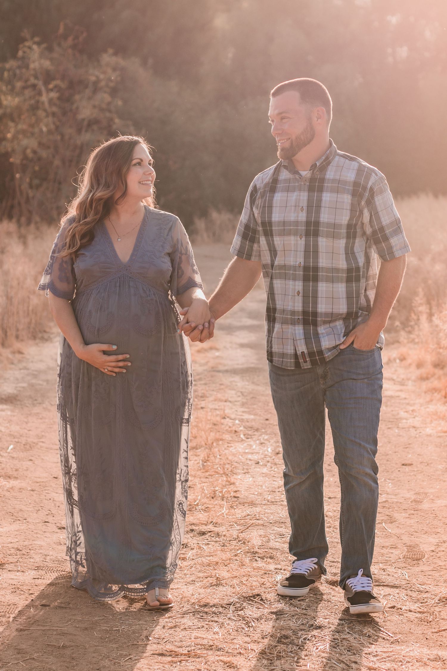 Glowing mom to be in a maternity portrait with Riverside photographer Kayla McDaniel
