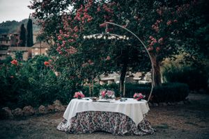 An elegant outdoor reception table setup for an intimate luxury micro wedding dinner in Mallorca.