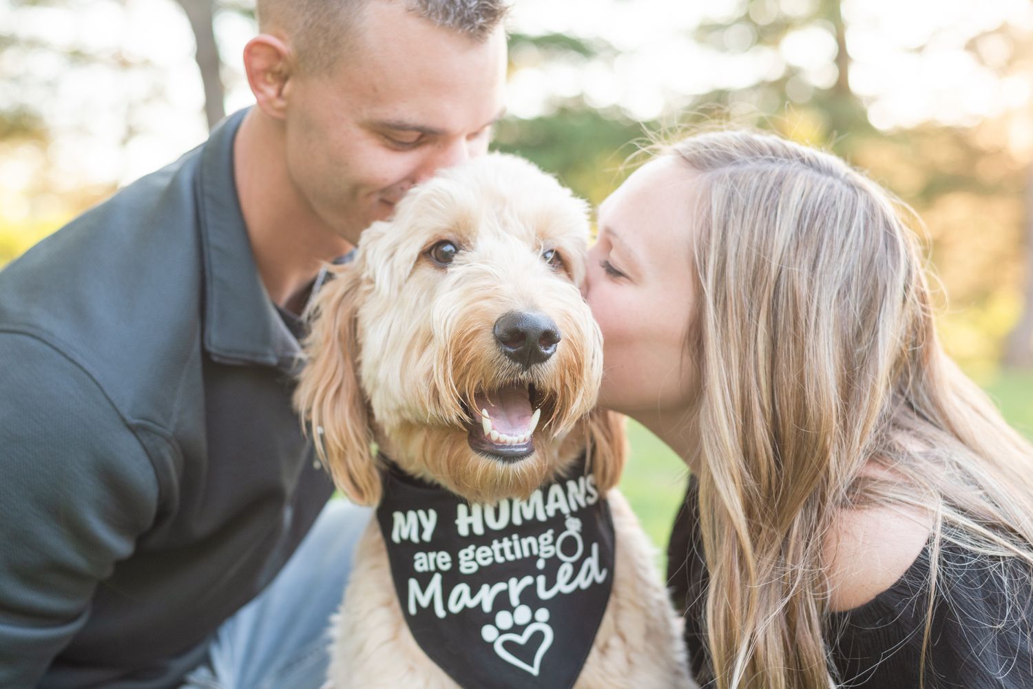 Couple with labradoodle dog with bandana that says my humans are getting married in St. Mary's Pennsylvania