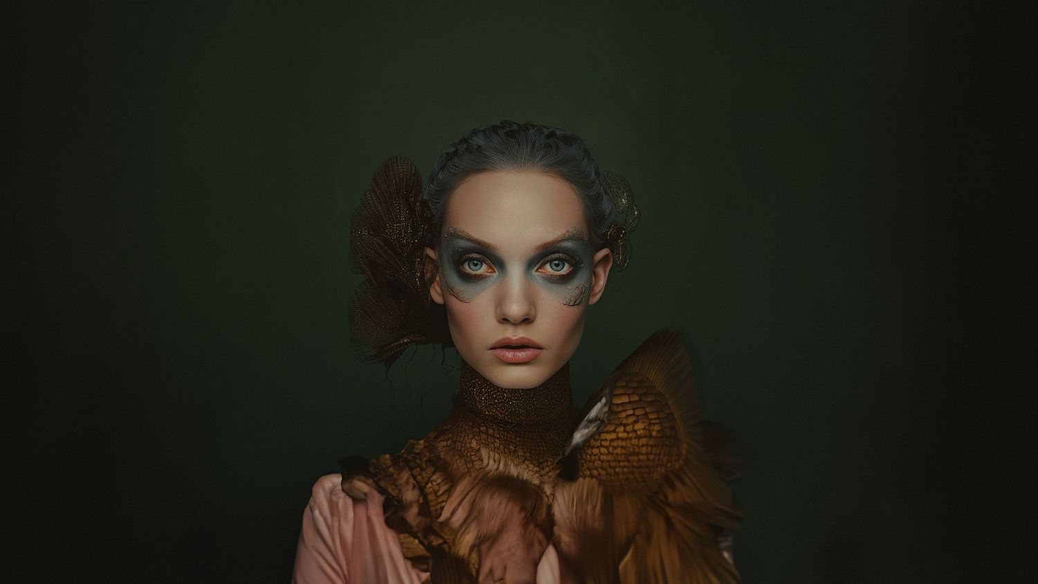Artistic portrait with ornate brown feather collar against dark green background in vintage fashion style.