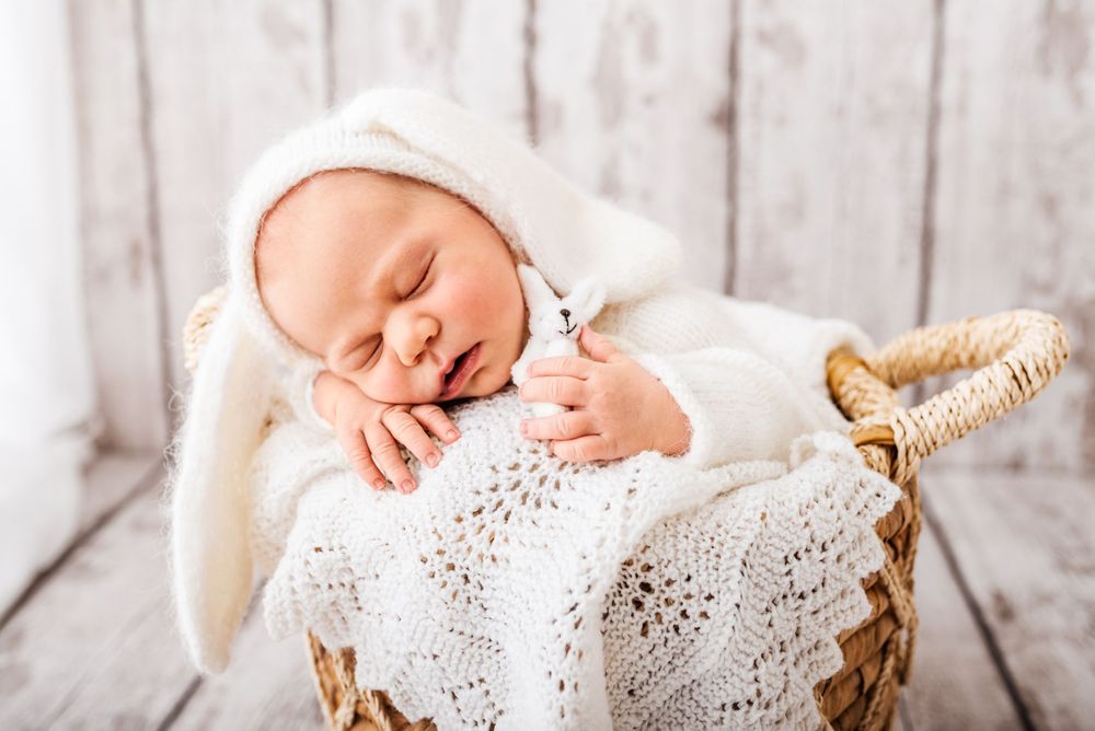 Natural newborn photography in home all-white studio Hereford