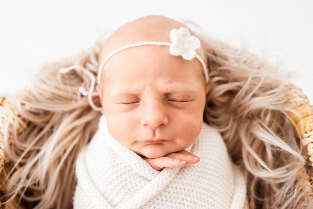 Natural newborn photography in home all-white studio Hereford