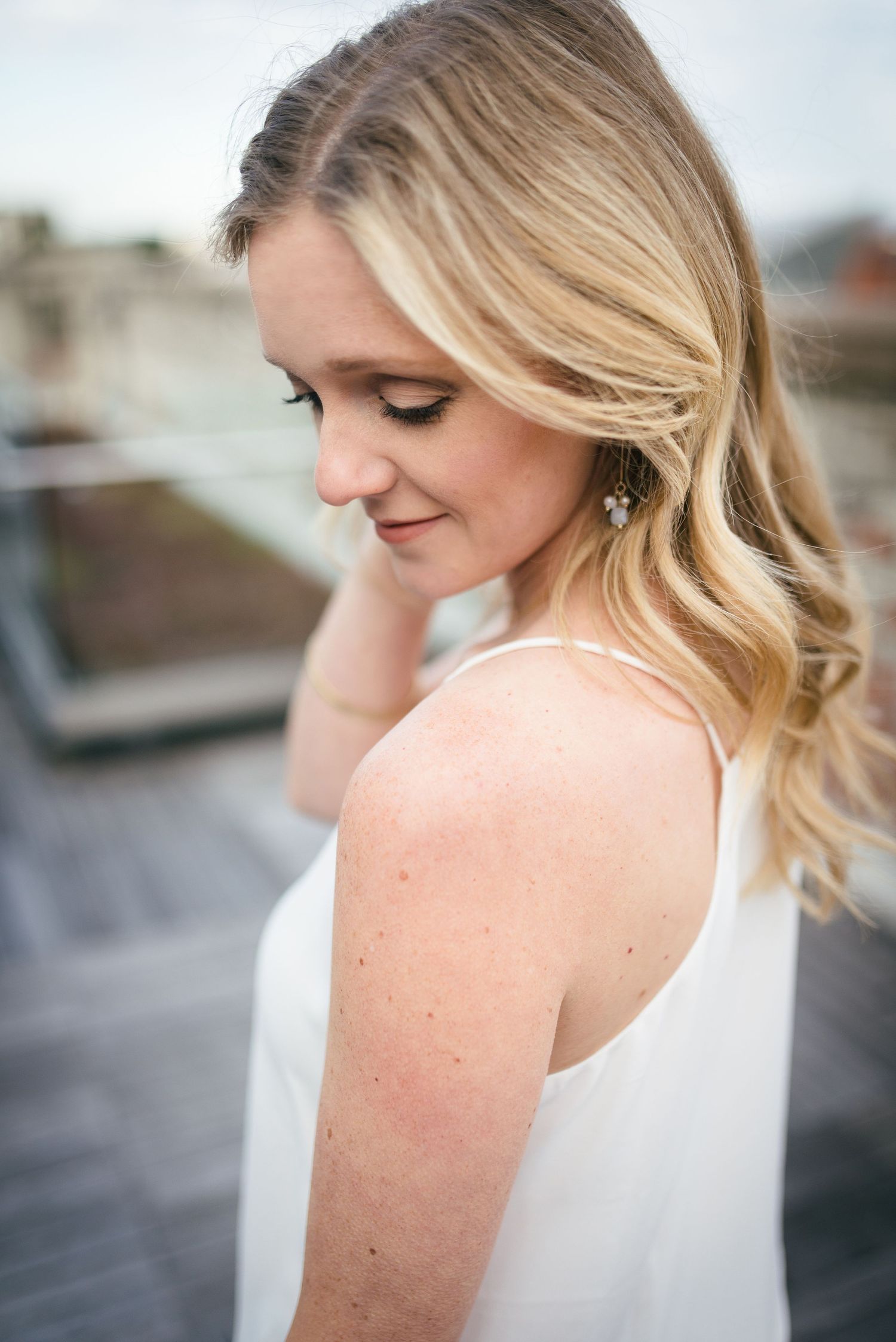 Lindsey, owner of Lindsey & Co. Boudoir looking down.