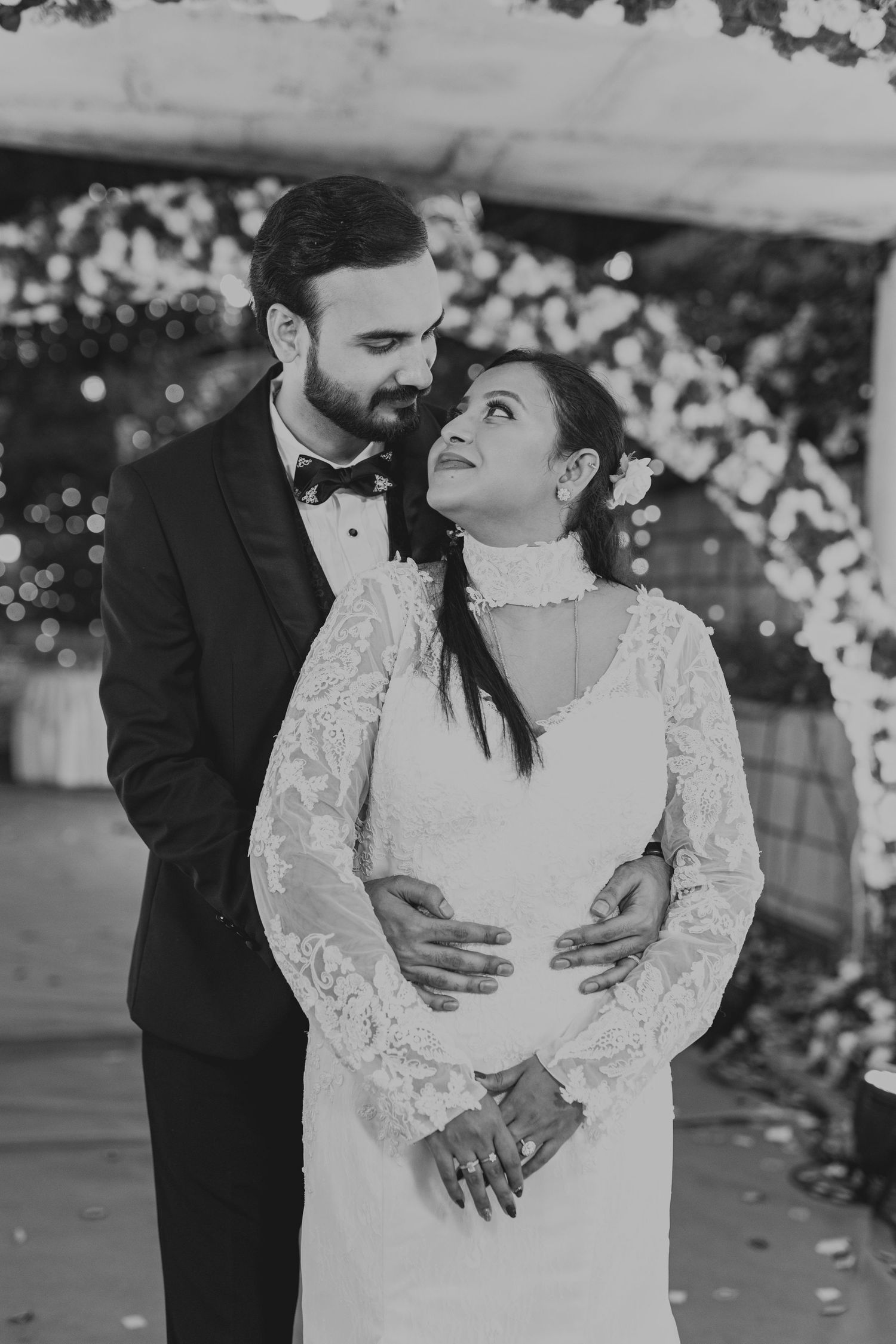 Black and white wedding photos capturing romantic dance moments.