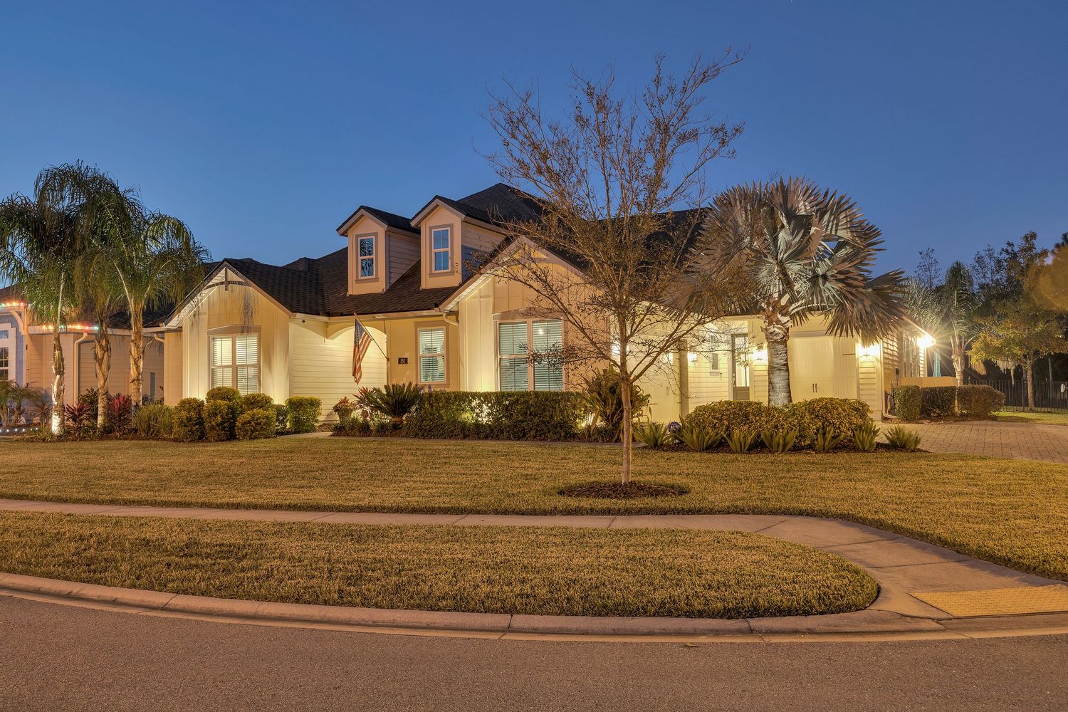 Twilight image of front of home.