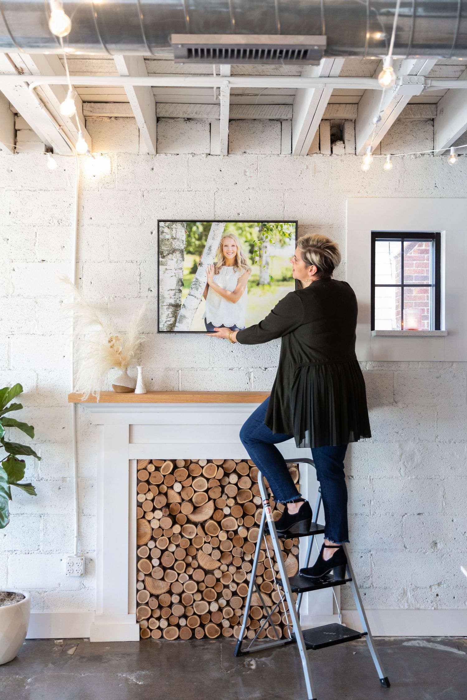 Aly Darin hanging wall art above fireplace, Beverly Hills, MI