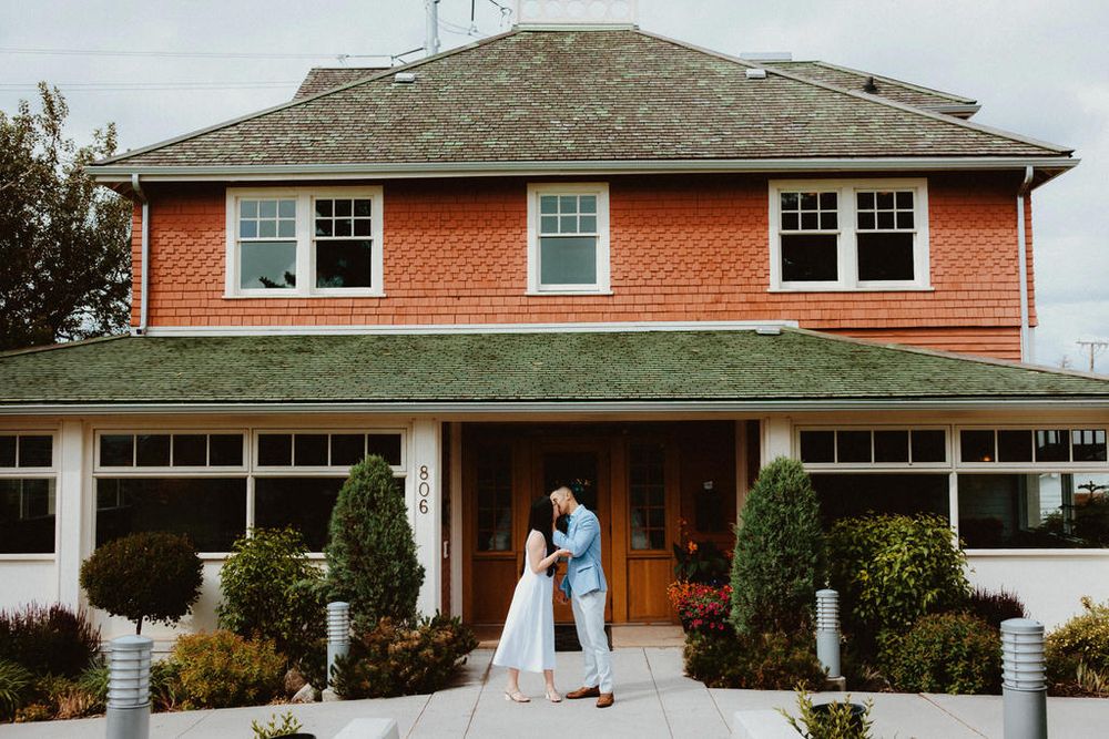 Engaged couple sharing a joyful moment in a scenic outdoor setting | Calgary engagement photographer capturing authentic love stories.