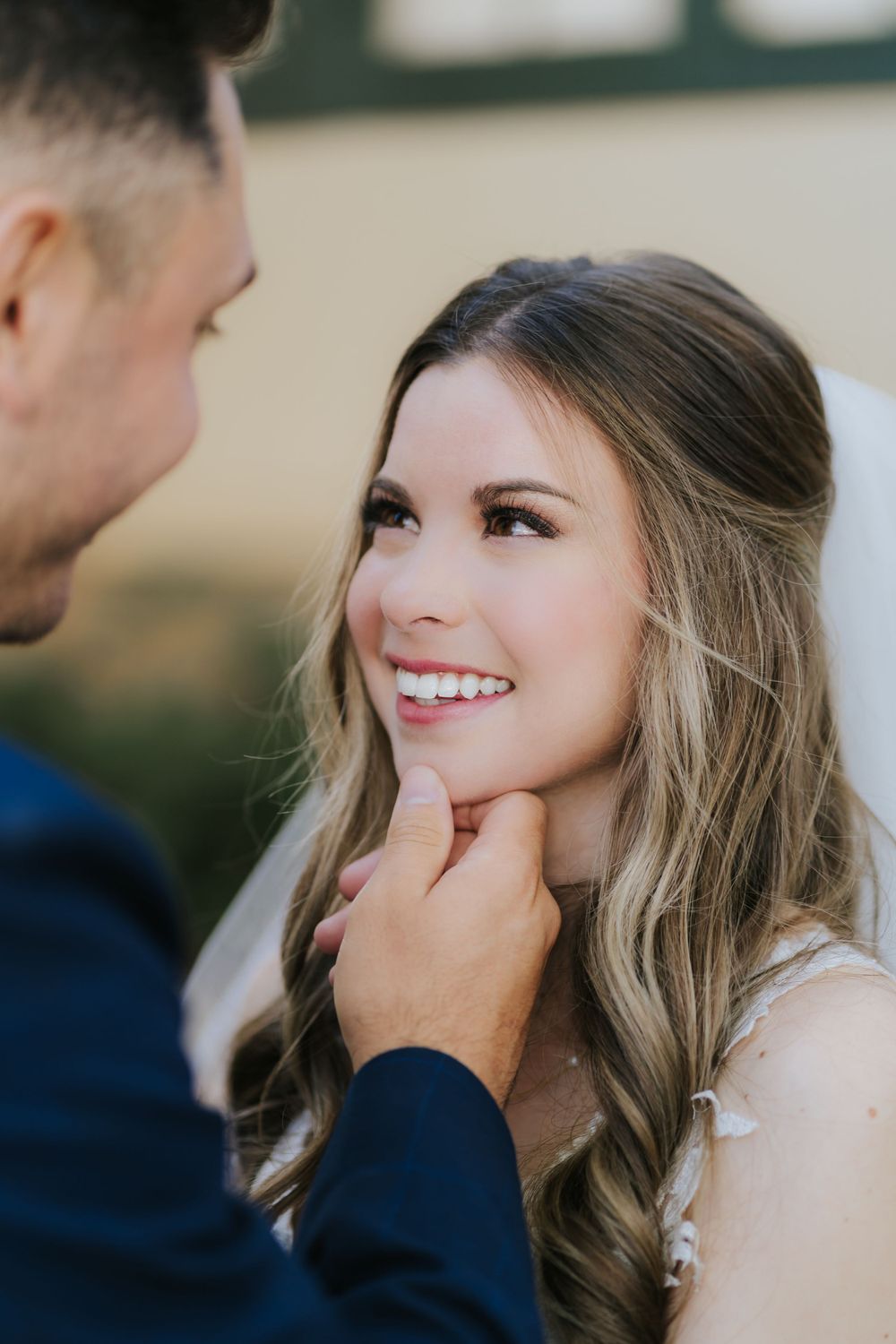 Romantic moment between couple during outdoor photoshoot.