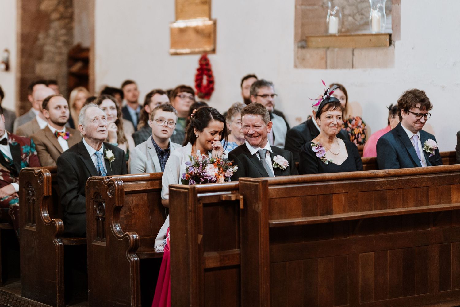 Lots of giggles from frienda and family in the church