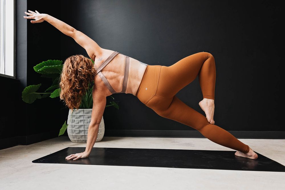 Athletic movement sequence demonstrating balance and strength on yoga mat.