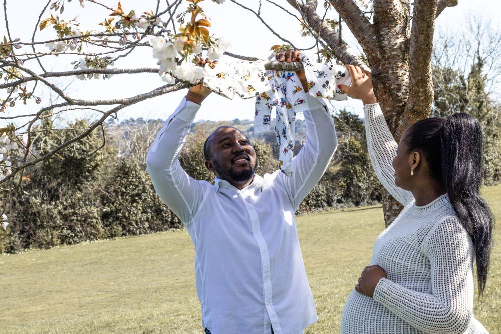 Joyful celebration outdoors in a sunny garden setting.