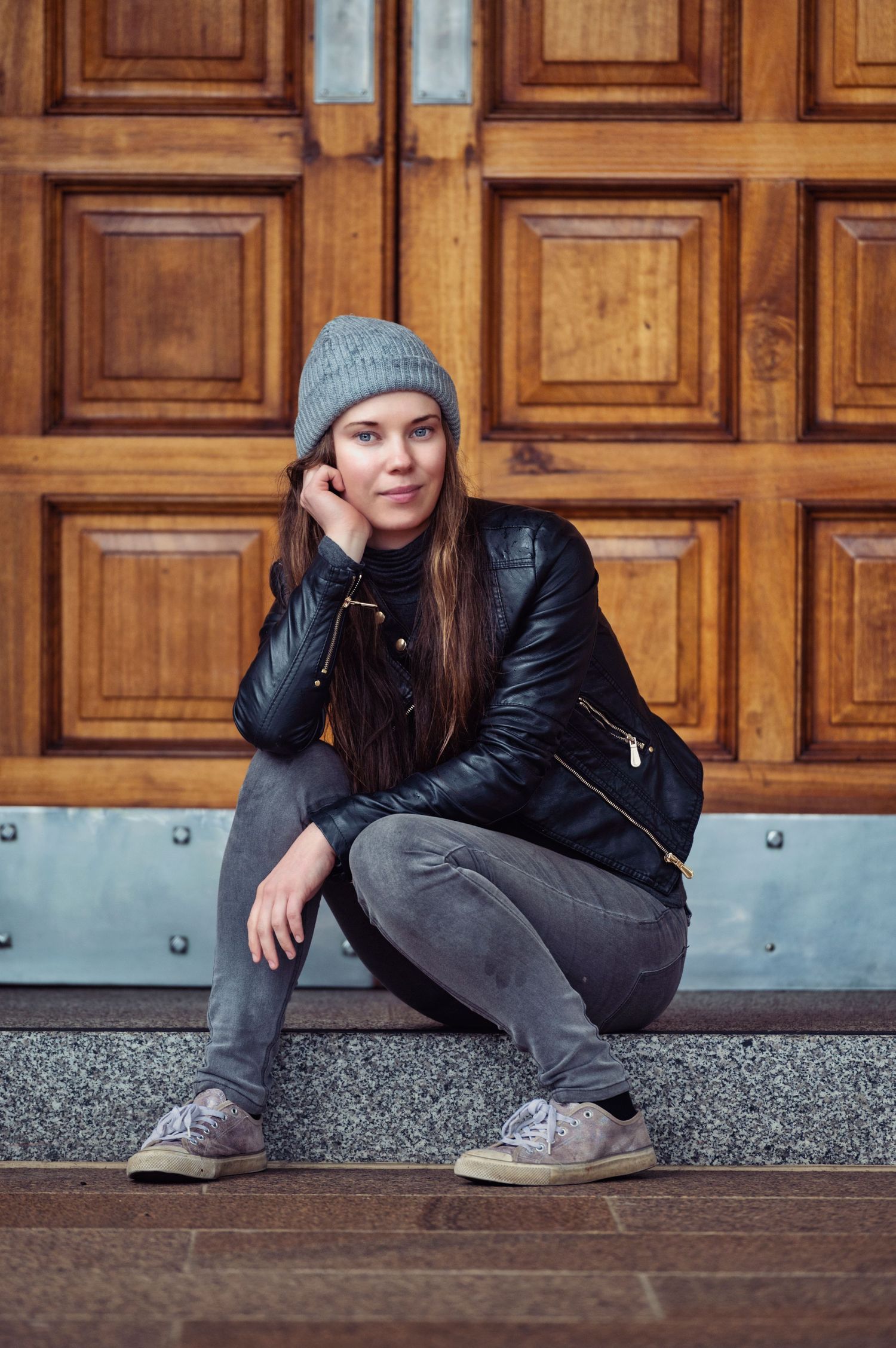 Girl sitting on a step