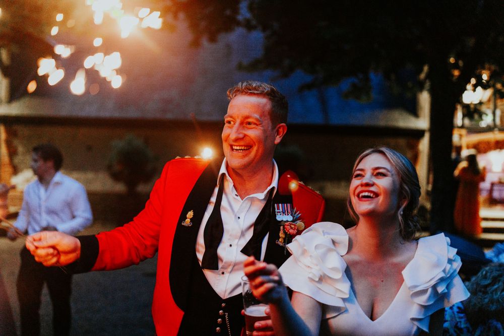 sparklers couple portraits at  bury court barn wedding in Hampshire