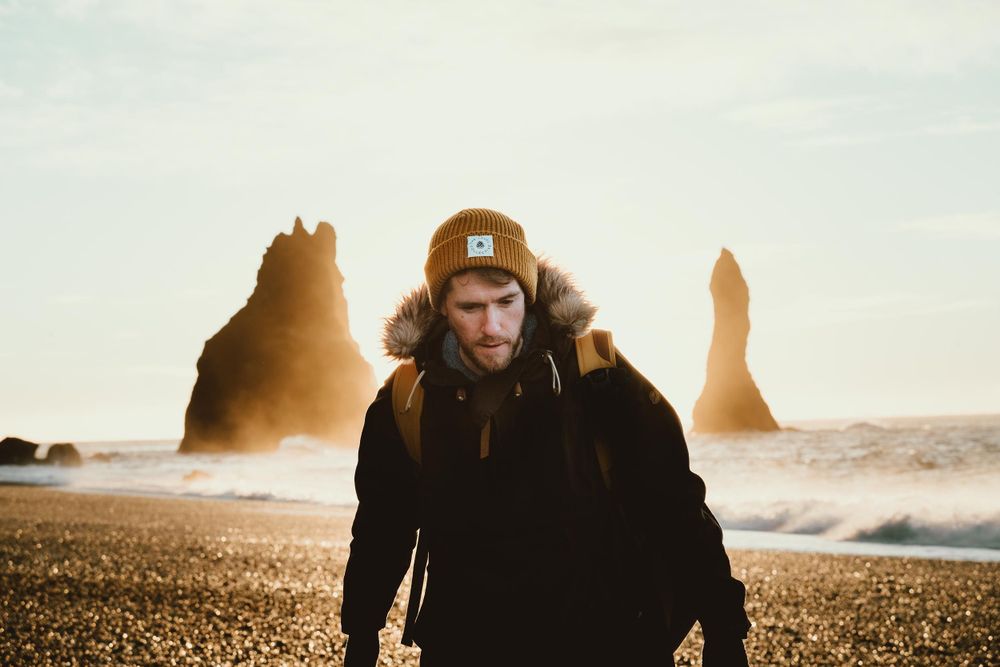 Man on beach in Iceland