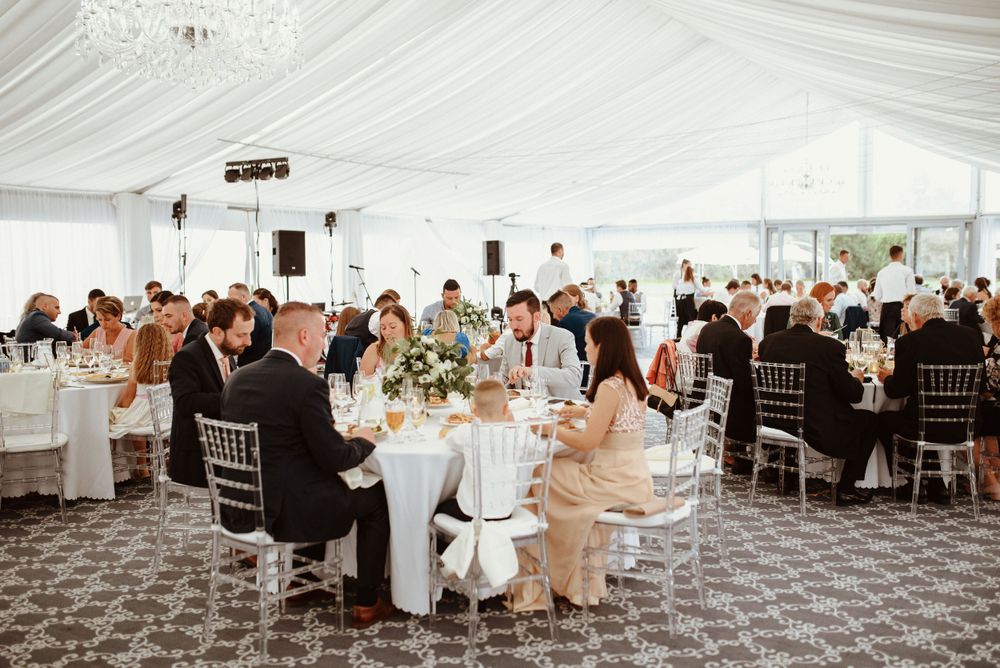 people eating at wedding reception