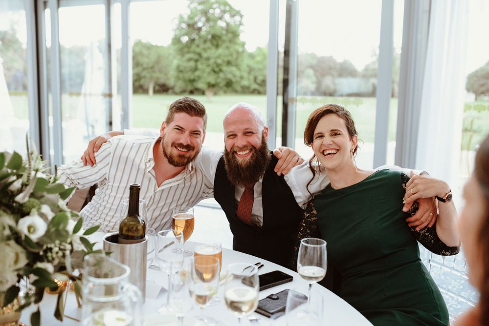 candid moments between wedding guests