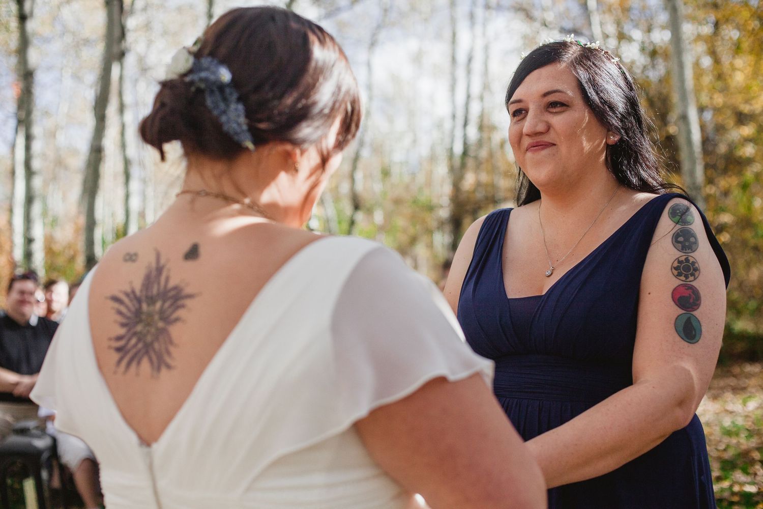 Brides holding hands at their intimate wedding in Park City.