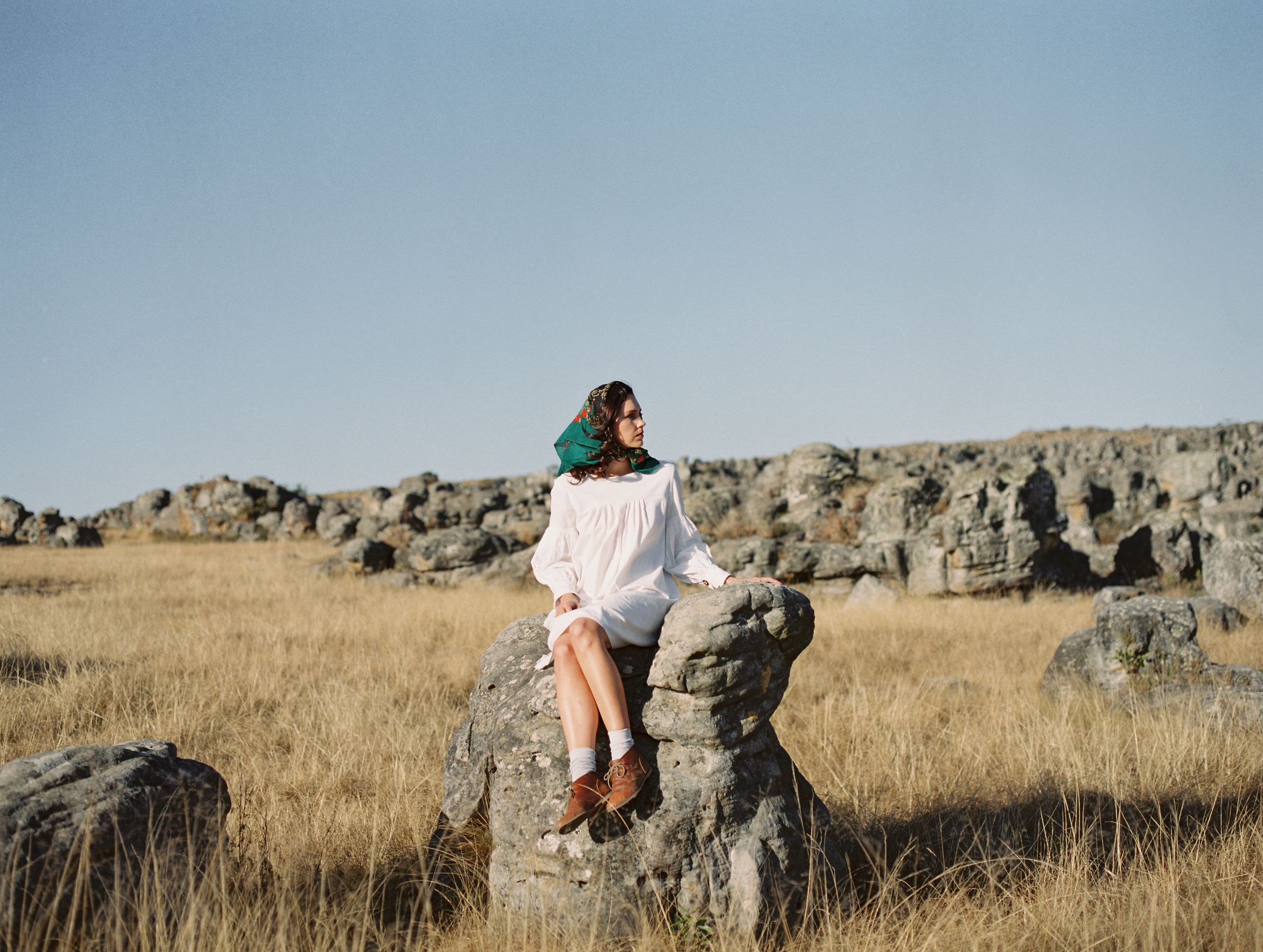A woman amongst the rocky outcrops at Kaapschehoop in South Africa. Captured on Kodak Portra 400 film.