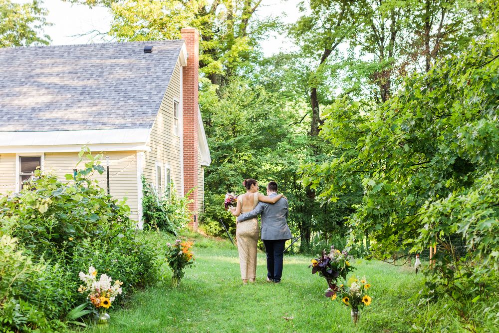 couple walk down aisle after wedding