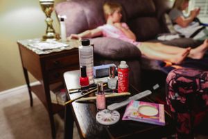 Close-up of personal care and beauty products arranged on a surface.