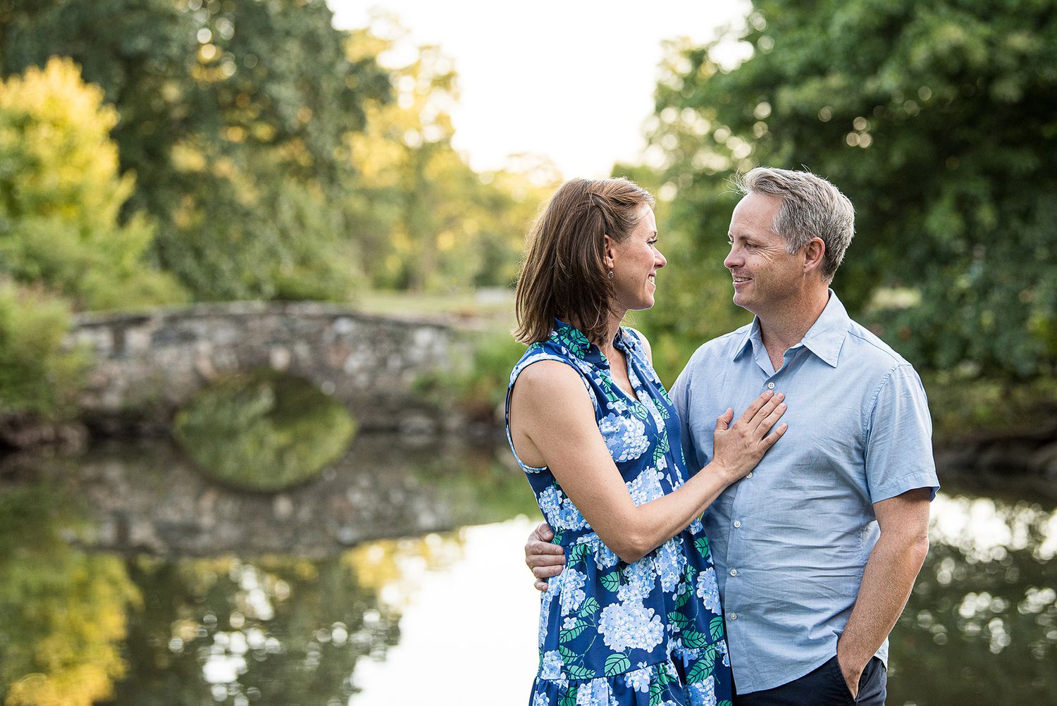 Smiling couple in idyllic park setting in Connecticut
