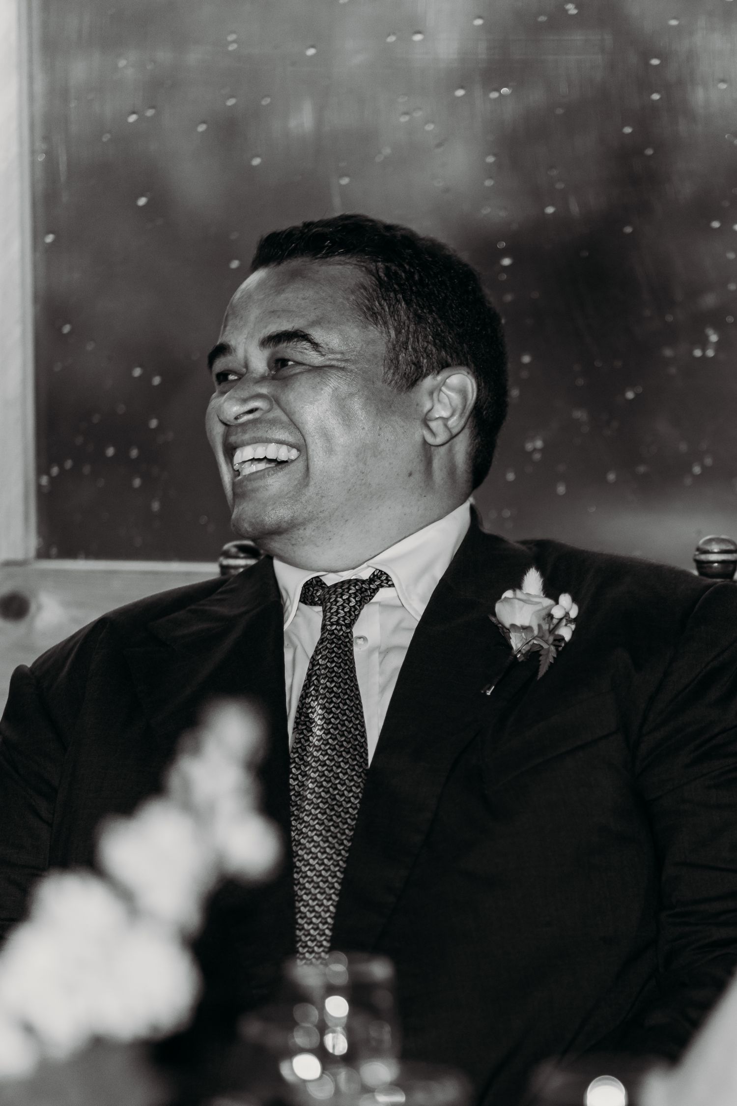 father of the bride laughing at wedding reception montreal