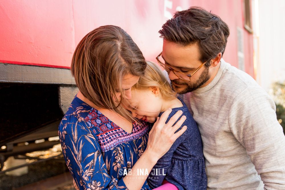 Family snuggling in Matthews, NC