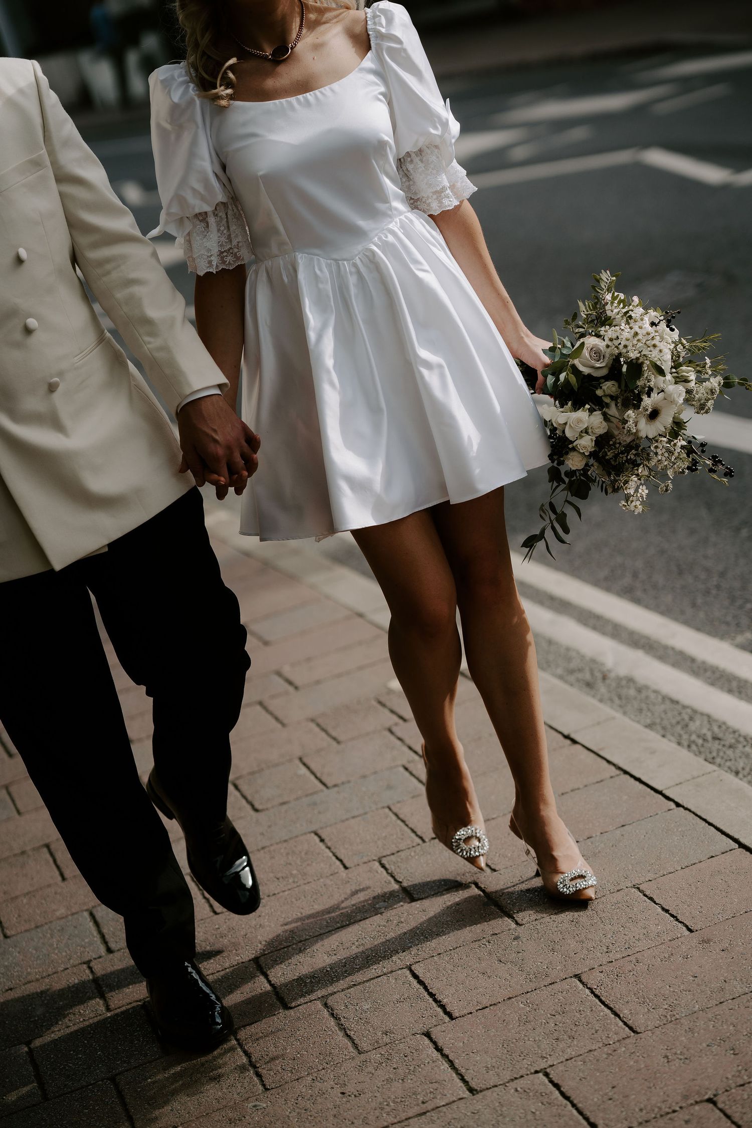 close up of brides dress and bouquet in oxford