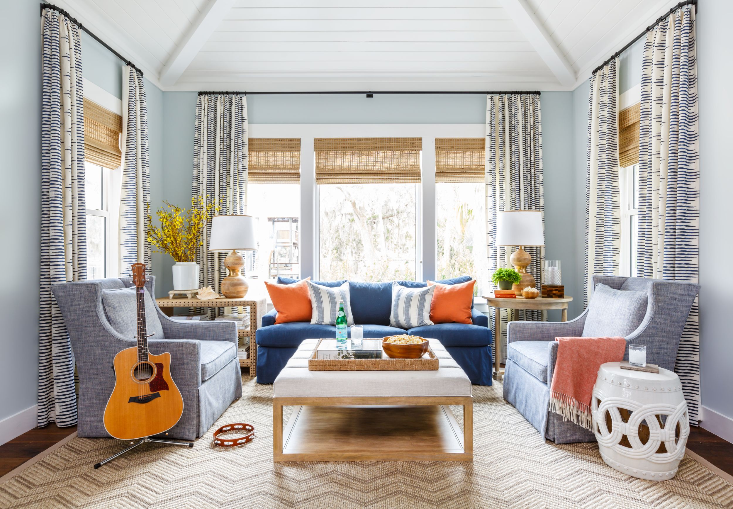Coastal and updated traditional entertainment room.