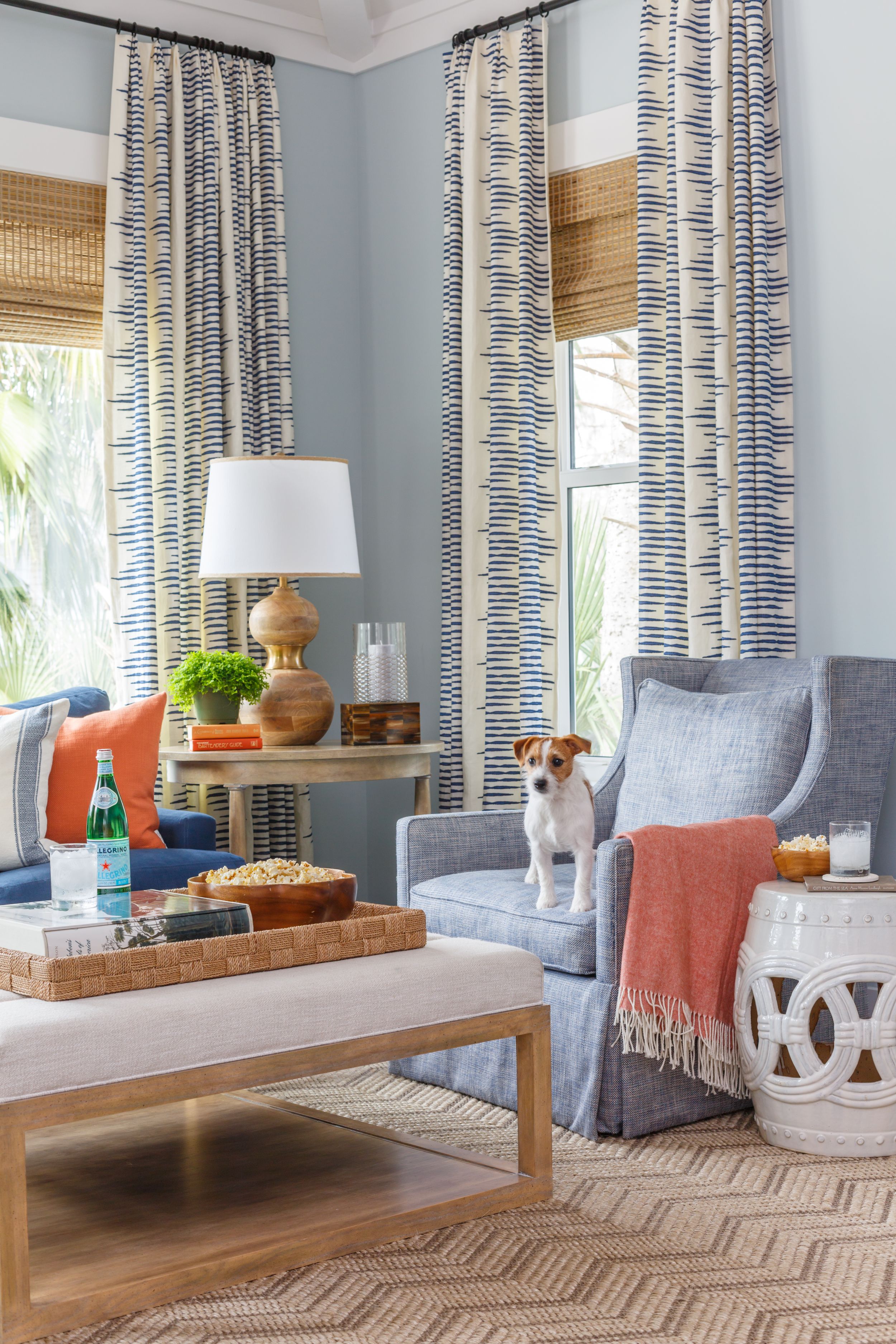 Coastal entertainment room with custom curtains and Lee Industries furniture.