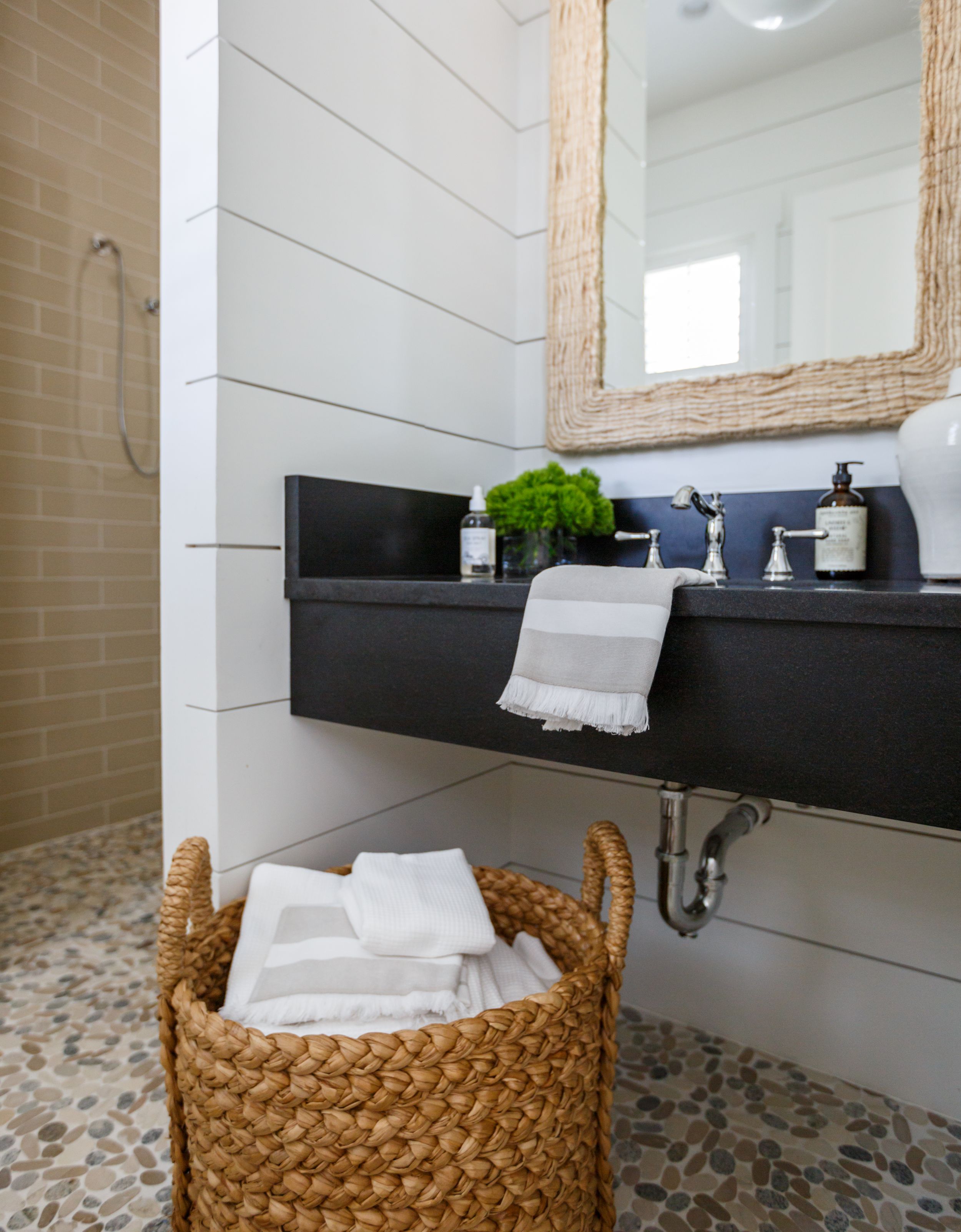Custom coastal bathroom designed by Orangerie Home.