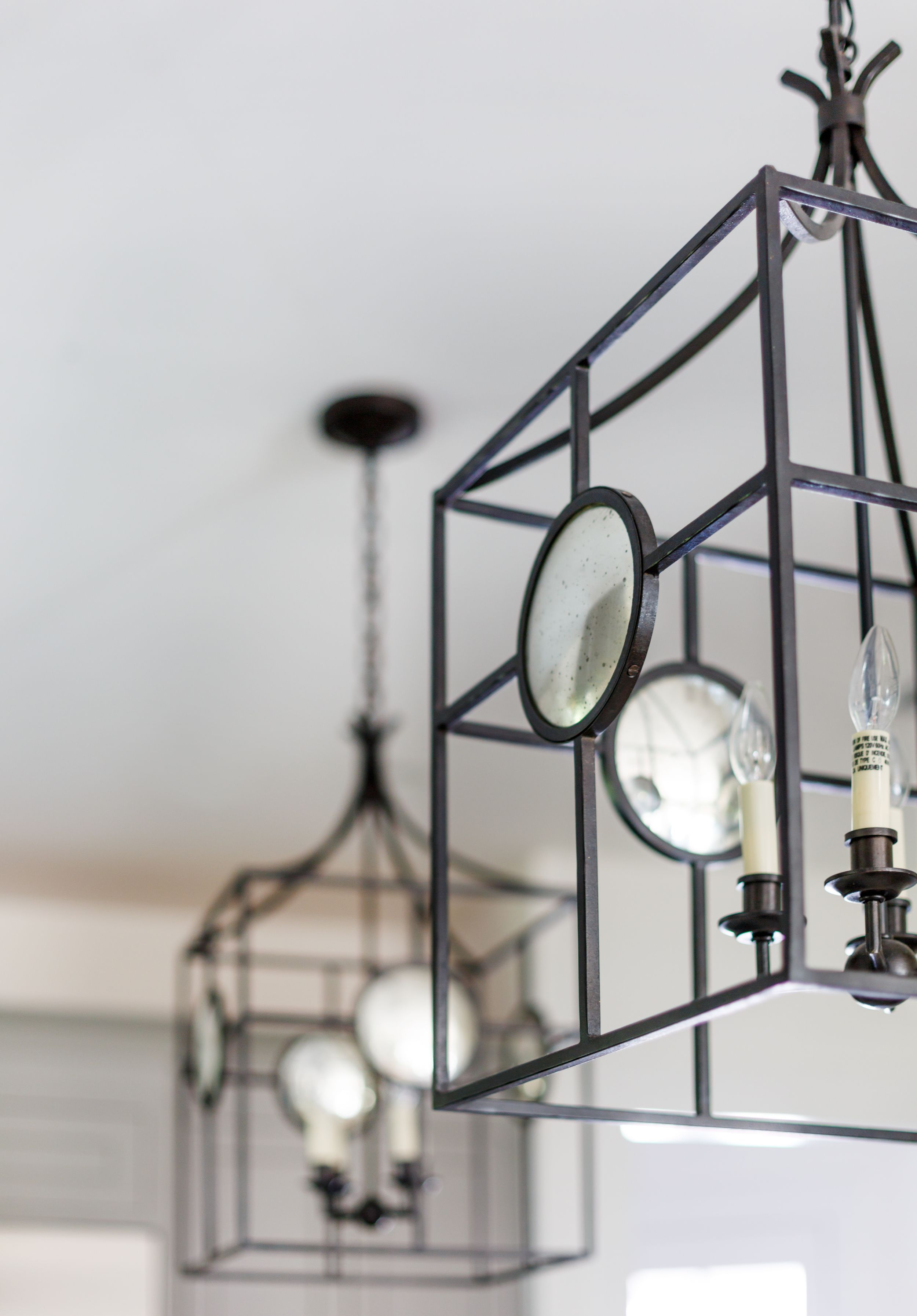 Visual comfort pendants in traditional kitchen.