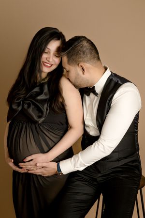 Maternal maternity photoshoot portraits elegant rich color black and brown formal theme Saskatoon and Warman photography, pregnancy shoot