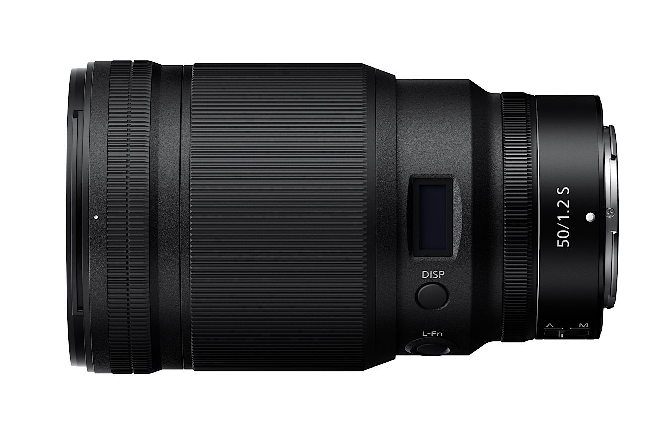 Black Nikon Z telephoto lens isolated on white background.