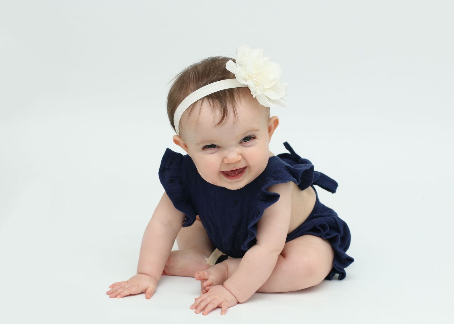 Baby Girl Sitting Unaided Happy Smiling. Newborn Photographer Tameside
