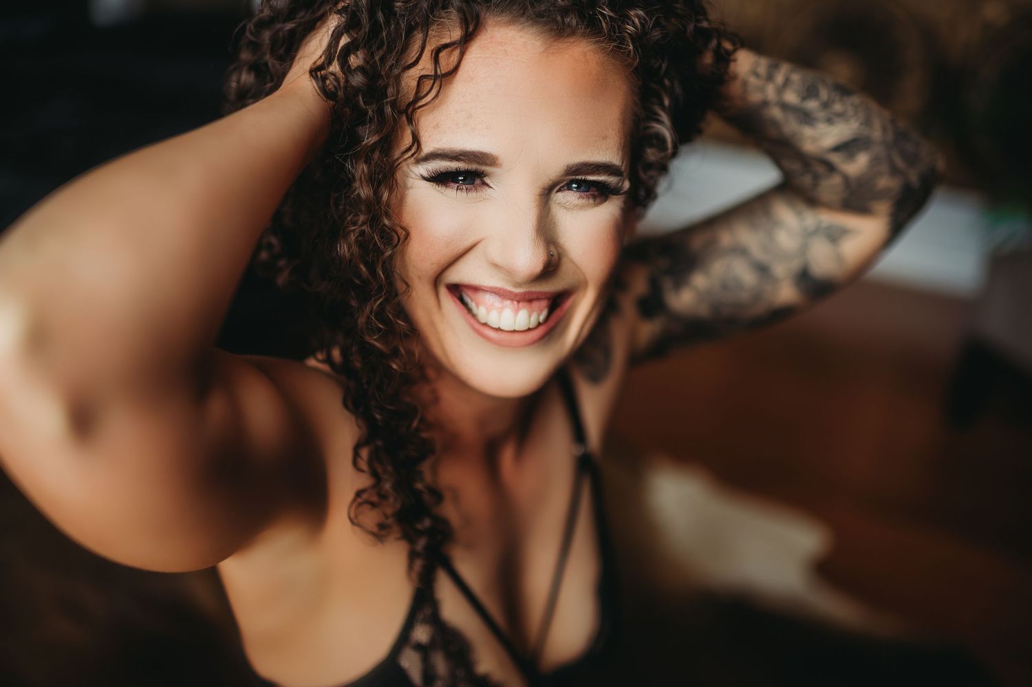 Boudoir session in Fishers showcasing a woman’s natural beauty and confidence.