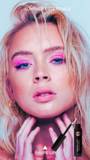 Beauty advertisement featuring vibrant pink makeup and mascara product against blue background.