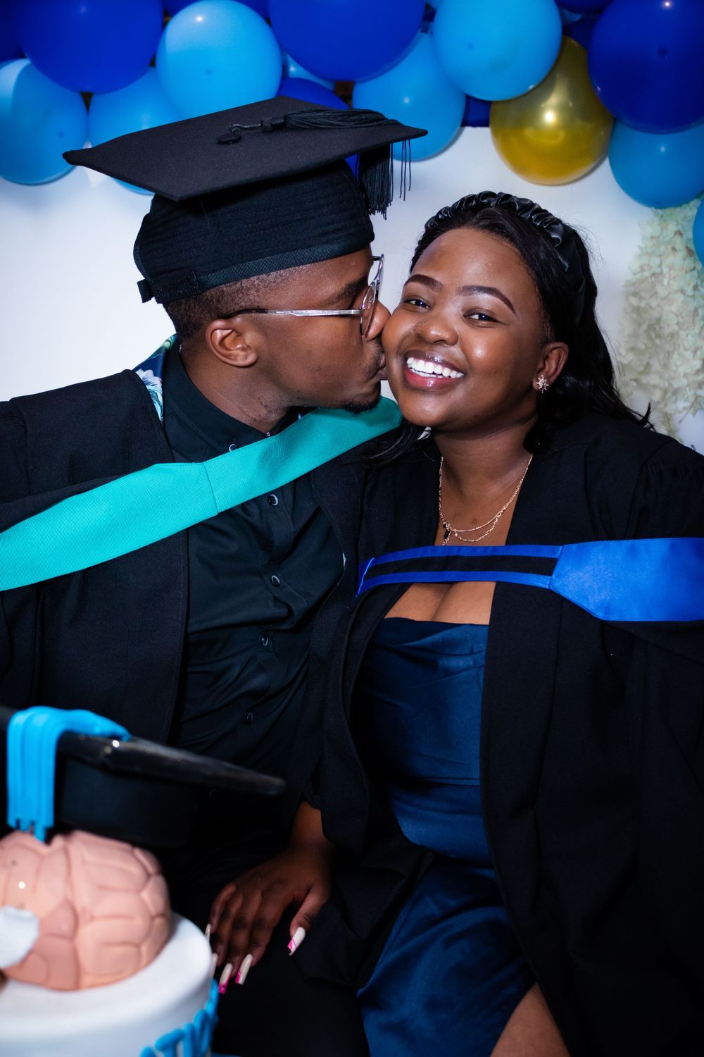Graduation shoot, with family gathering together to celebrate their sons graduation.