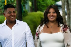 couple walking and laughing